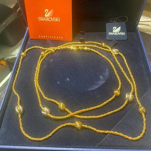 Swarovski 50" chain gold tone with crystals